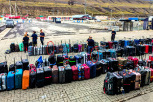 All suitcases were brought ashore before breakfast.